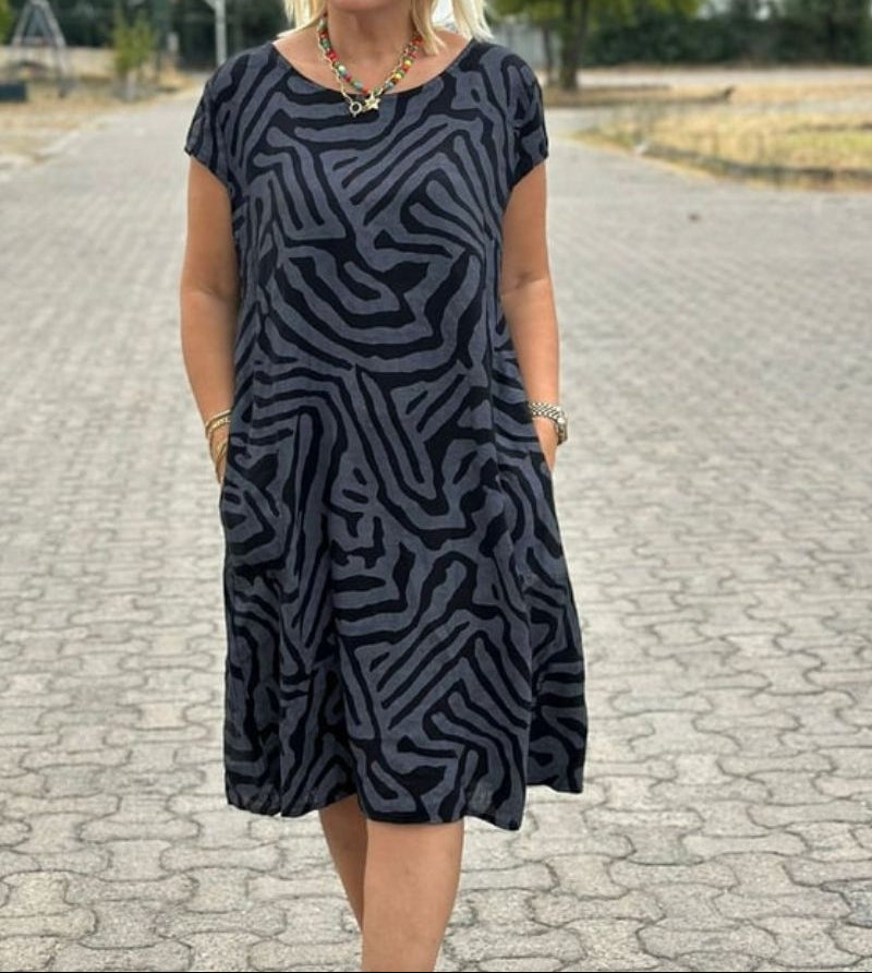Solina™ – Jurk met ronde hals en prachtige buikbedekkende print