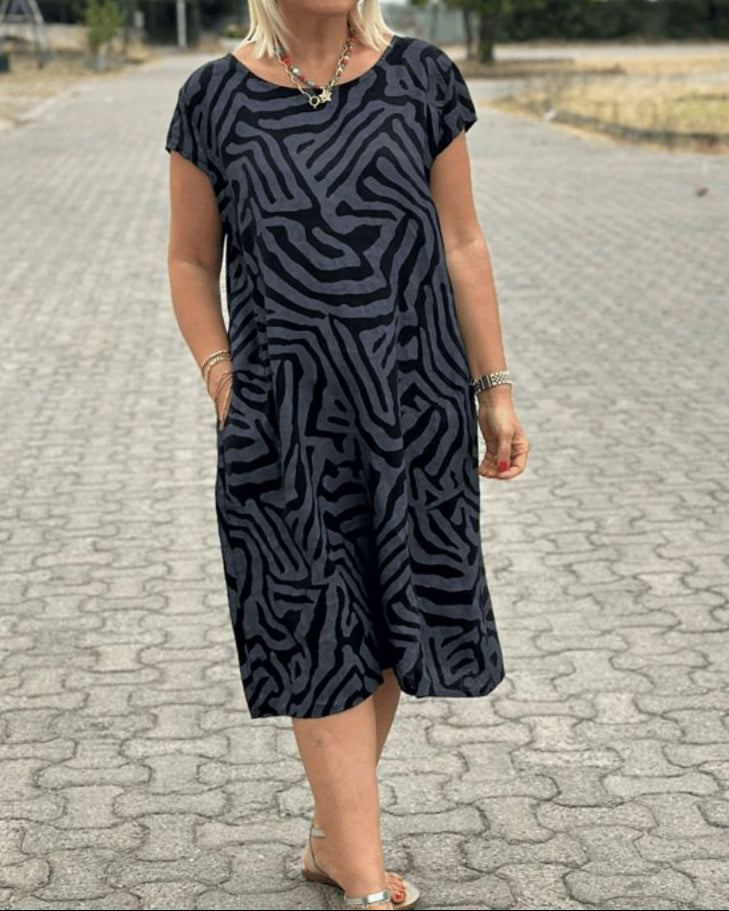 Solina™ – Jurk met ronde hals en prachtige buikbedekkende print