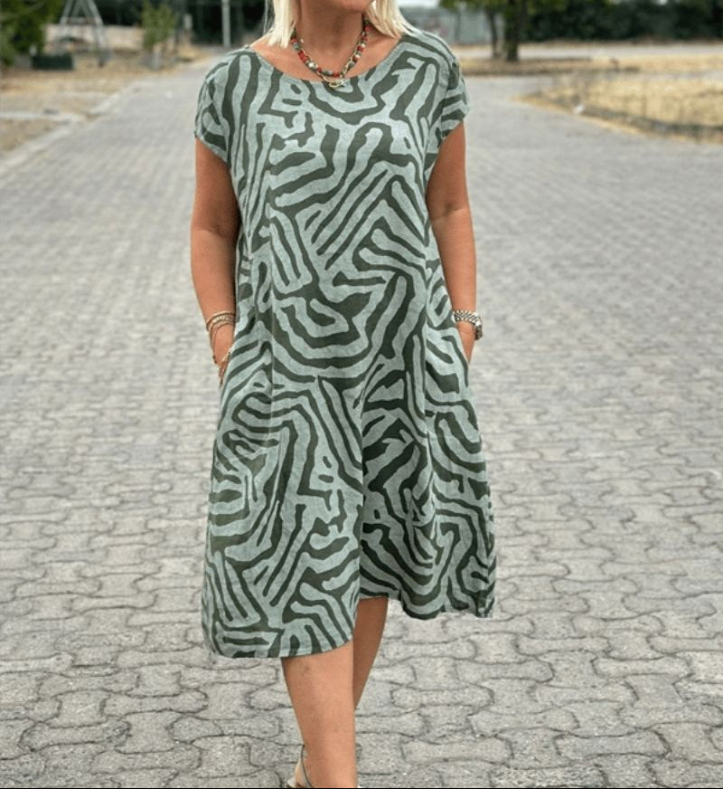 Solina™ – Jurk met ronde hals en prachtige buikbedekkende print