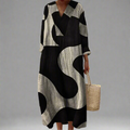 Claudine™ – Vloeiende maxi-jurk met abstracte print