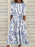 Sela™ – Zomerse midi-jurk met elegante bloemenprint