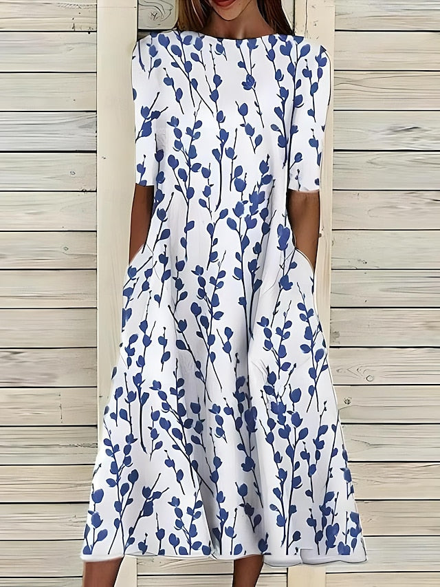 Sela™ – Zomerse midi-jurk met elegante bloemenprint