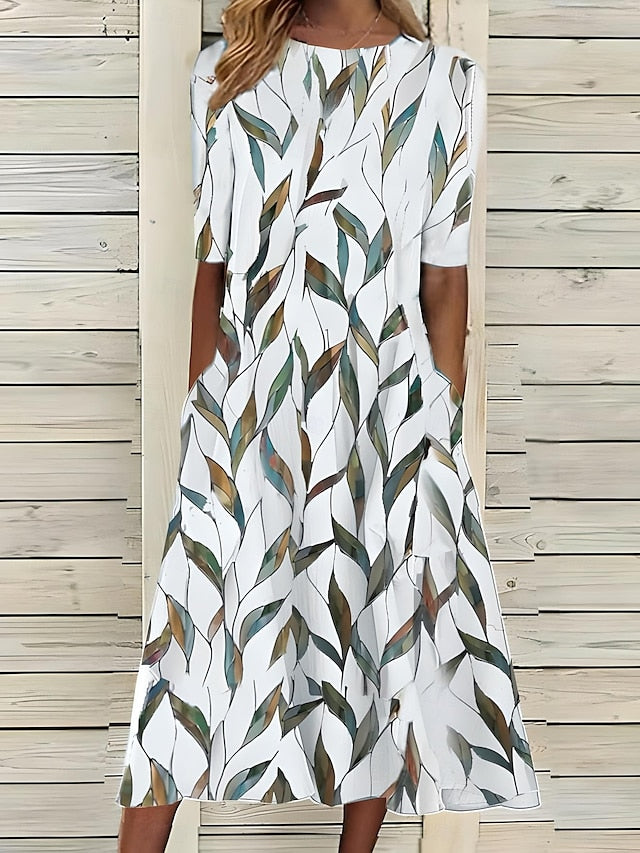 Sela™ – Zomerse midi-jurk met elegante bloemenprint
